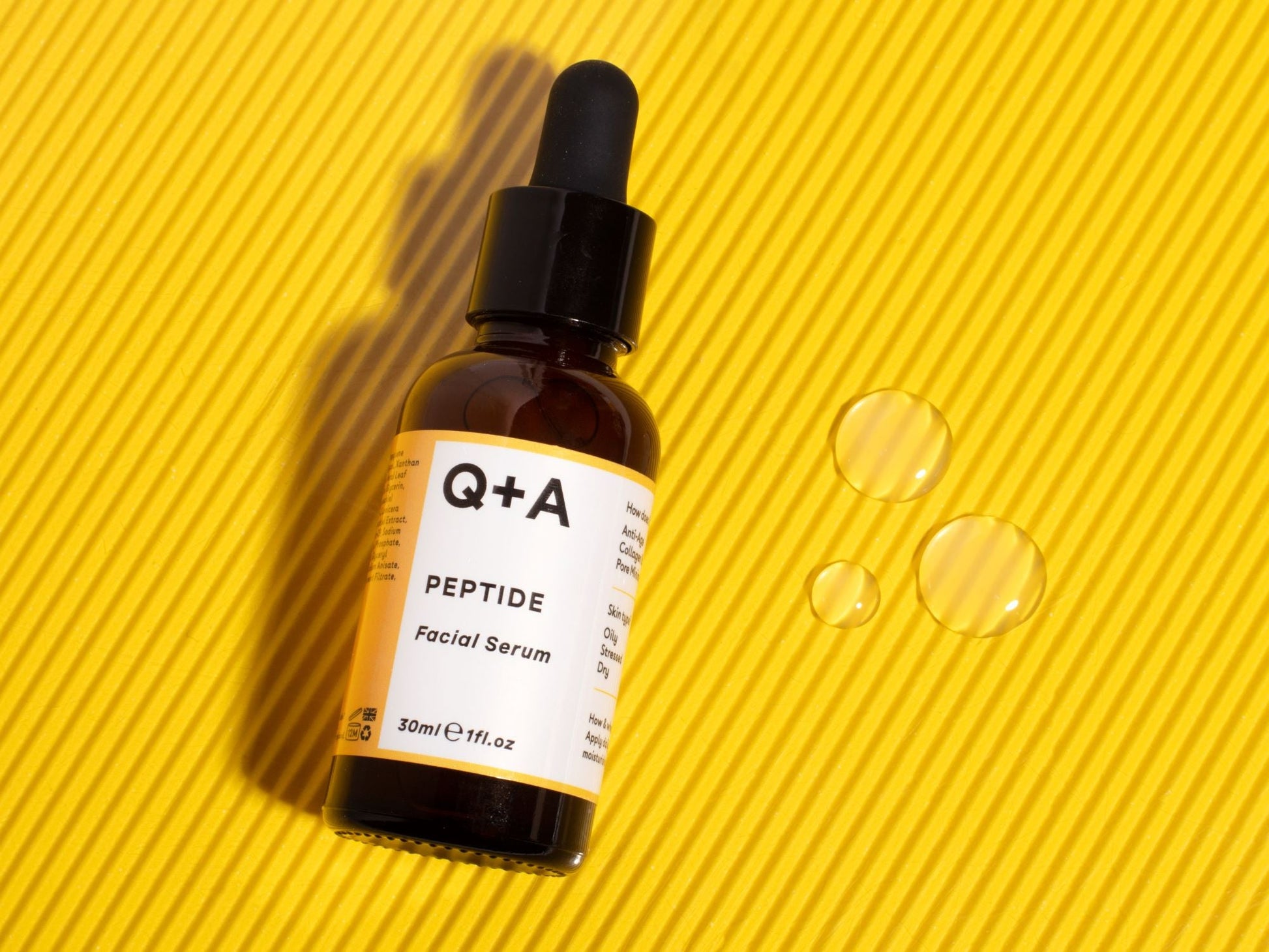 Q+A Peptide Facial Serum -anti-age-seerumi peptidiseerumi lasipullossa